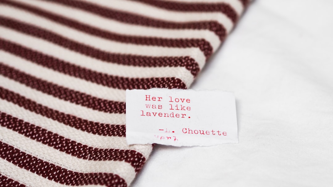 white and red stripe textile