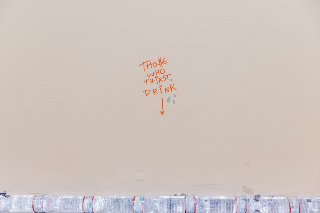 a white wall with some writing on it