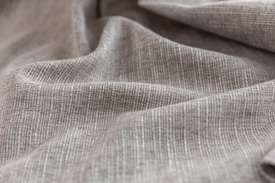Close-up of gray, textured fabric.